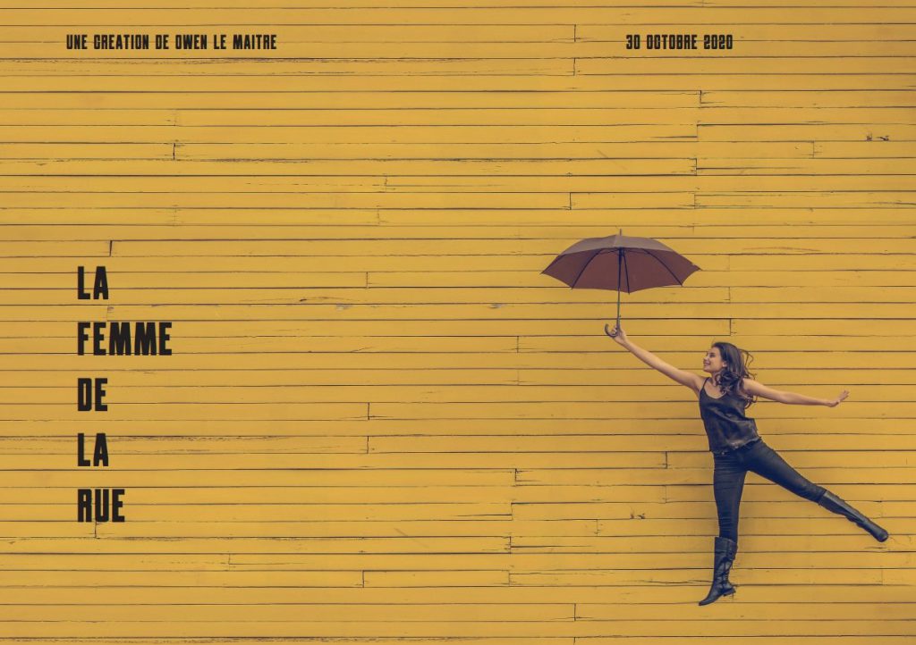 Femme sautant avec un parapluie, sans sol sous elle, impression de voler. Un mur en bois, jaune se trouve derrière elle. Le titre de l'affiche, la femme de la rue, aligne chacun des mots verticalement, un à la suite.